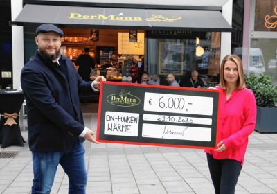 Ein Funken wärme scheckübeegabe an barbara stöckl , bäckerei der mann, michalel mann